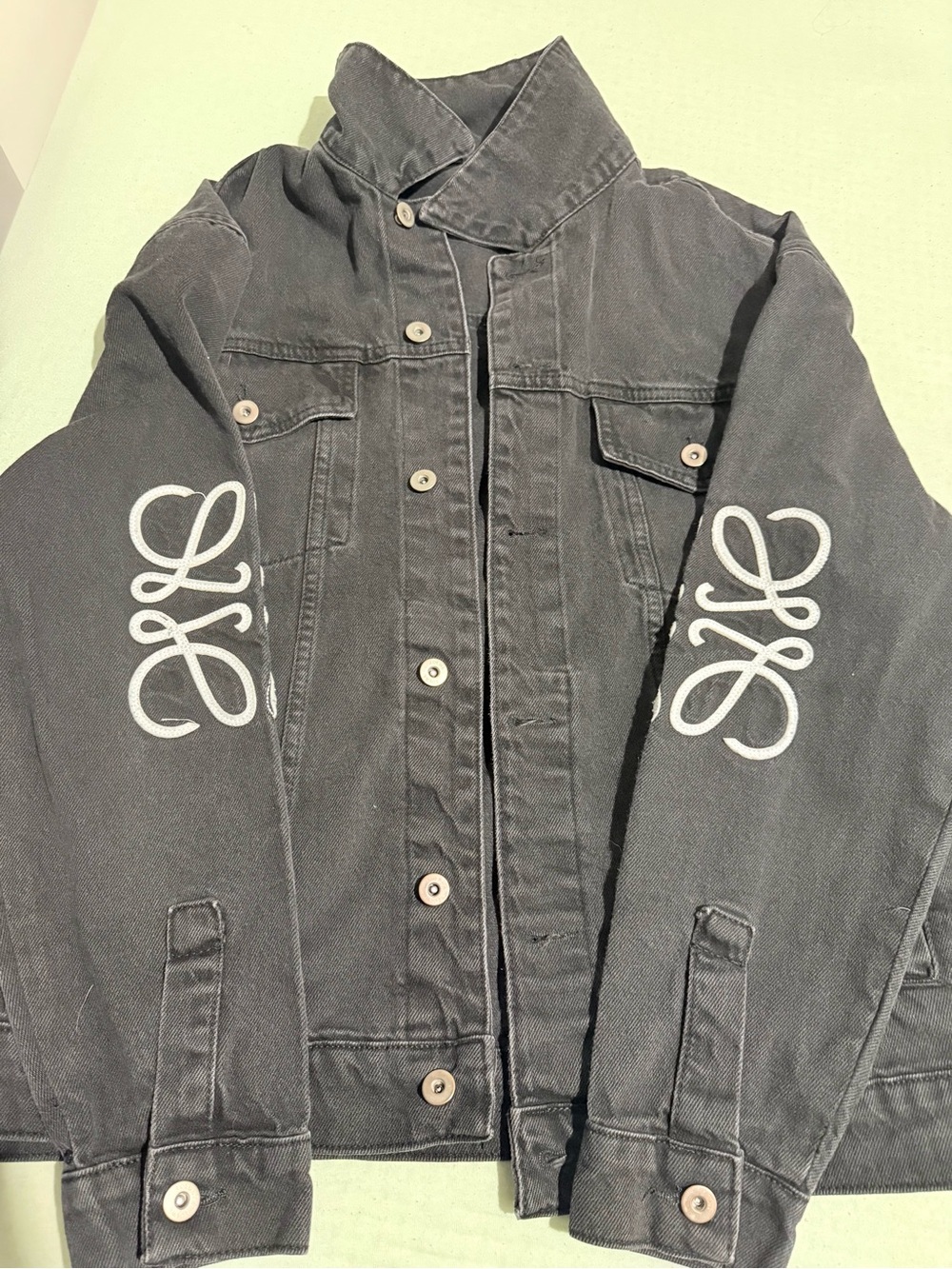 Loewe Black Denim Jacket with White Sleeve Motif